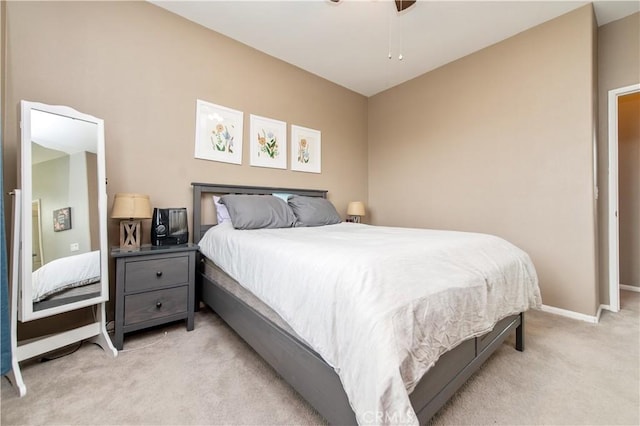 12440 Constellation St, Eastvale, CA 91752 - bedroom with light colored carpet, baseboards, and ceiling fan