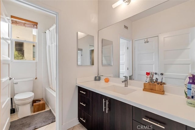 full bath featuring vanity, toilet, tile patterned floors, shower / bath combination with curtain, and baseboards