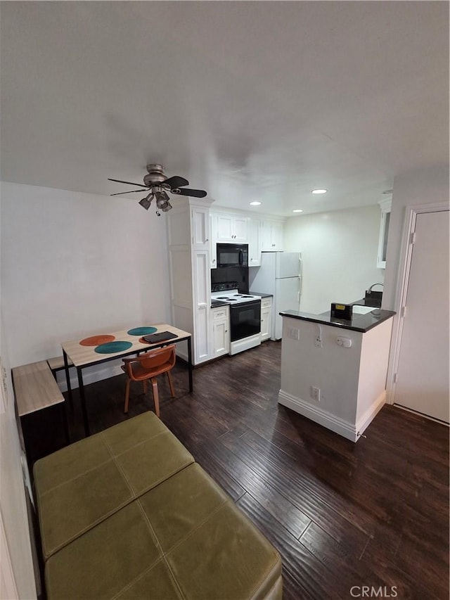 dining space featuring dark wood-type flooring, a ceiling fan, and recessed lighting