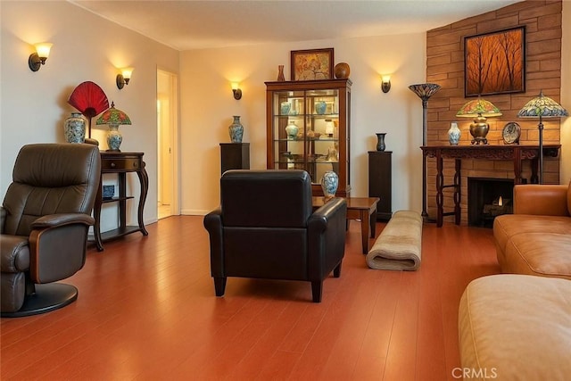 1600 N Hobart Blvd Unit 16, Los Angeles, CA 90027 - living area with wood finished floors and a fireplace