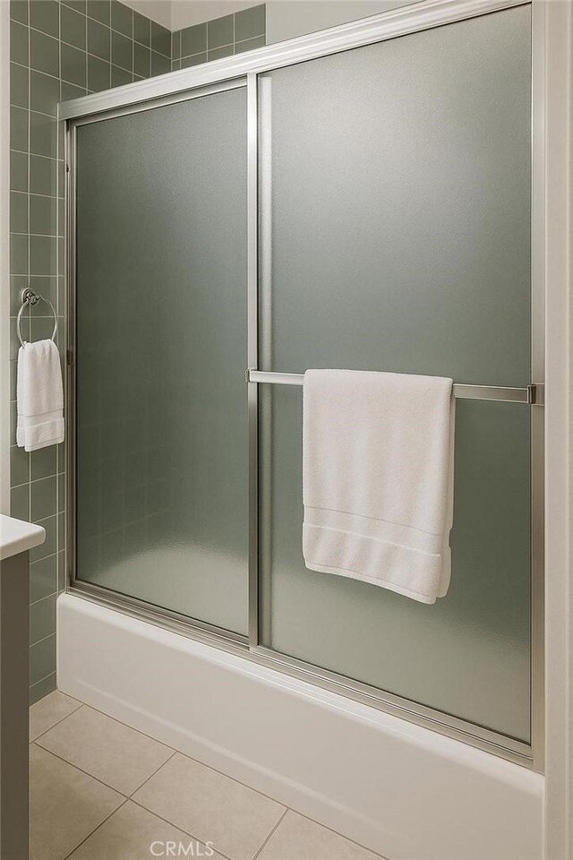 1600 N Hobart Blvd Unit 16, Los Angeles, CA 90027 - bathroom featuring tile patterned floors, bath / shower combo with glass door, and vanity