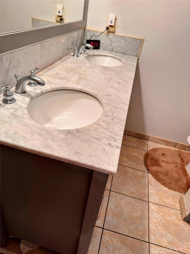 1600 N Hobart Blvd Unit 16, Los Angeles, CA 90027 - bathroom featuring tile patterned floors and double vanity