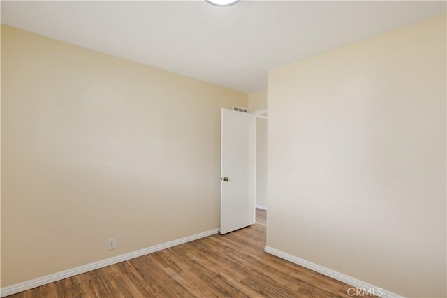 1808 W Palm Dr, West Covina, CA 91790 - unfurnished room with baseboards and wood finished floors