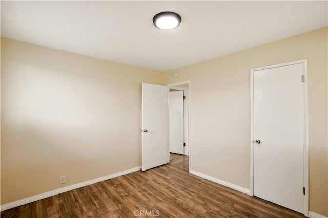 1808 W Palm Dr, West Covina, CA 91790 - unfurnished bedroom with wood finished floors and baseboards
