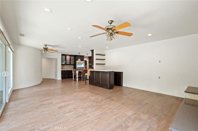 10356 Claire Ave, Porter Ranch, CA 91326 - unfurnished living room featuring ceiling fan, light wood-type flooring, recessed lighting, and baseboards