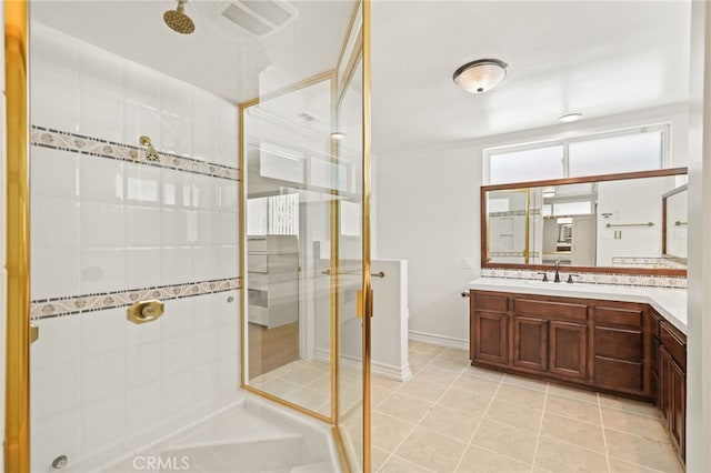 10356 Claire Ave, Porter Ranch, CA 91326 - full bathroom featuring tiled shower, tile patterned floors, vanity, and baseboards