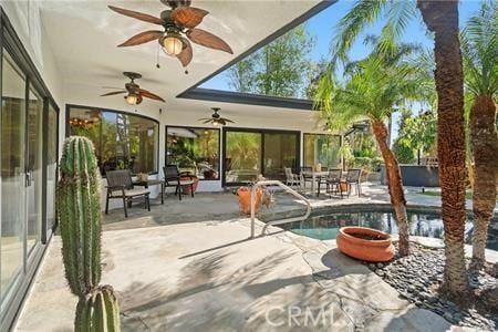 10356 Claire Ave, Porter Ranch, CA 91326 - swimming pool featuring a ceiling fan, a patio, and outdoor dining space