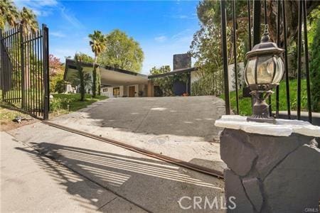 10356 Claire Ave, Porter Ranch, CA 91326 - view of street with a gated entry