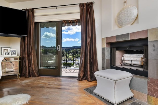 4950 Campo Rd, Woodland Hills, CA 91364 - entryway with a fireplace and hardwood / wood-style flooring