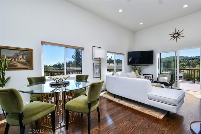 4950 Campo Rd, Woodland Hills, CA 91364 - dining room featuring dark wood-style flooring, healthy amount of natural light, high vaulted ceiling, and recessed lighting