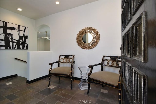 4950 Campo Rd, Woodland Hills, CA 91364 - sitting room with recessed lighting, baseboards, dark stone finish flooring, and an upstairs landing