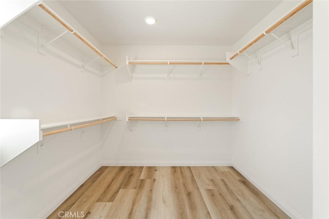 17210 Pioneer Way, San Bernardino, CA 92407 - walk in closet with light wood finished floors