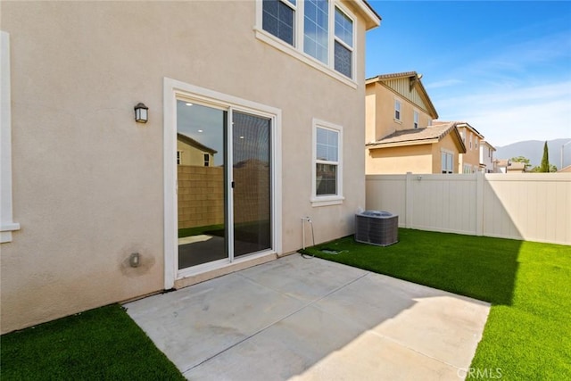 17210 Pioneer Way, San Bernardino, CA 92407 - rear view of house with stucco siding and a patio
