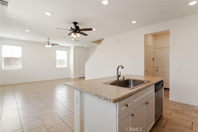 17210 Pioneer Way, San Bernardino, CA 92407 - kitchen featuring dishwasher, a ceiling fan, healthy amount of natural light, light countertops, and recessed lighting
