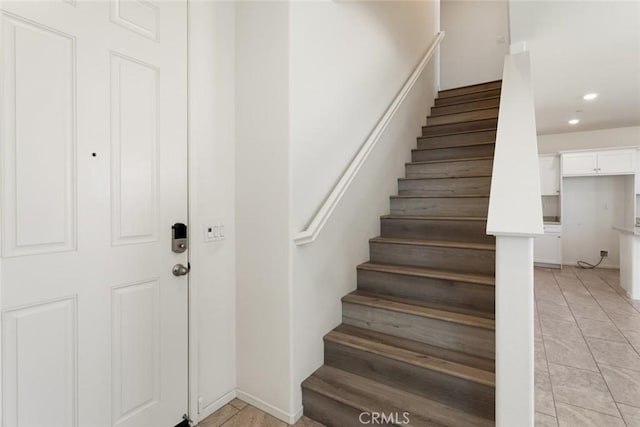 17210 Pioneer Way, San Bernardino, CA 92407 - stairway featuring recessed lighting and tile patterned floors