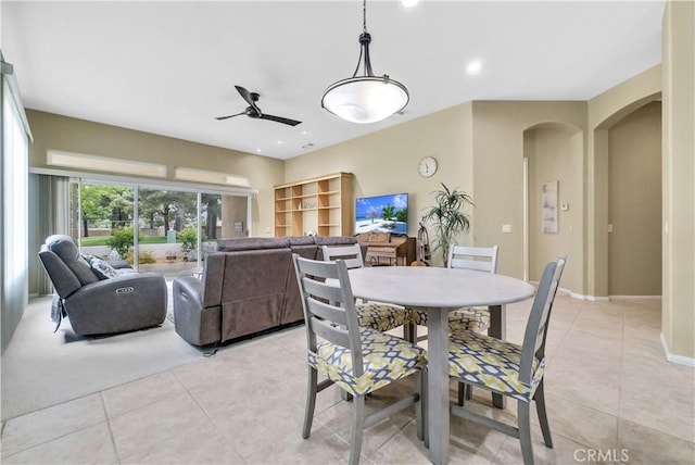 440 Brooklawn Dr, Banning, CA 92220 - dining area featuring light tile patterned floors, ceiling fan, arched walkways, recessed lighting, and baseboards