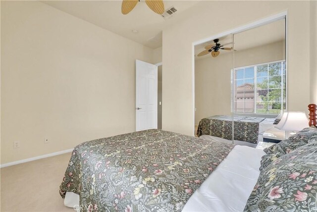 440 Brooklawn Dr, Banning, CA 92220 - bedroom featuring carpet floors, a ceiling fan, baseboards, and a closet
