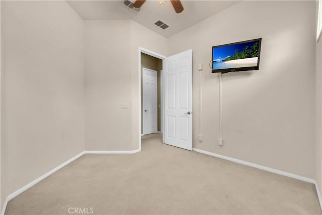 440 Brooklawn Dr, Banning, CA 92220 - unfurnished bedroom featuring light carpet, baseboards, and ceiling fan