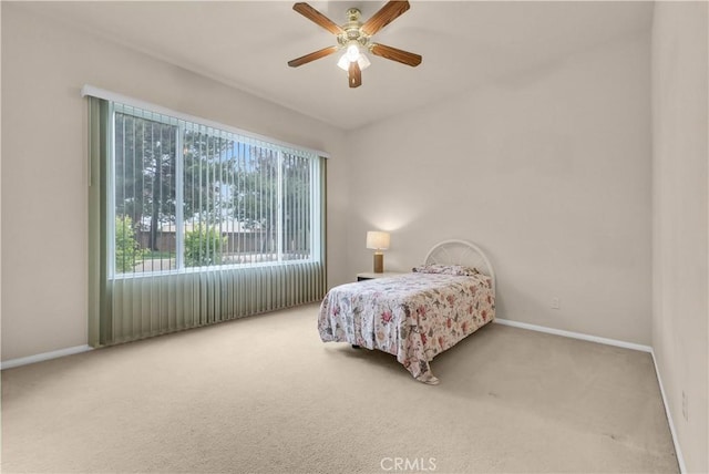 440 Brooklawn Dr, Banning, CA 92220 - carpeted bedroom featuring baseboards and a ceiling fan