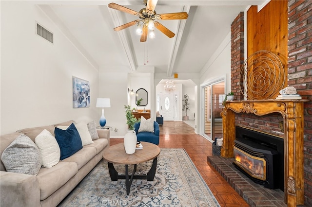 living area with beam ceiling, ceiling fan, and baseboards
