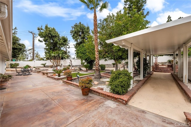 view of patio / terrace featuring a fenced backyard and outdoor dining space