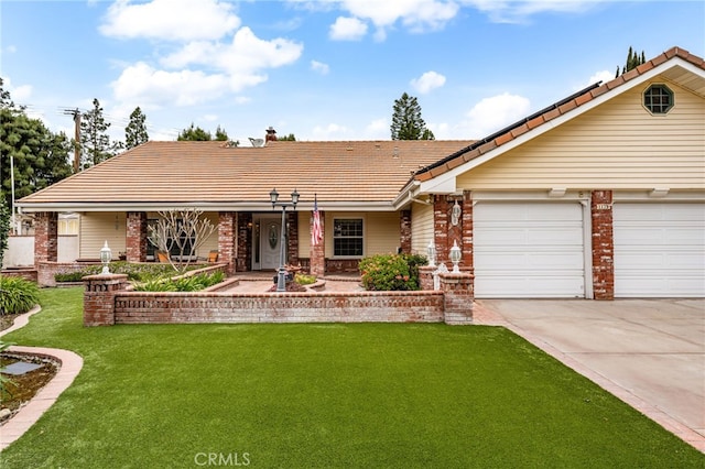 single story home featuring a tiled roof, driveway, a front yard, a porch, and a garage