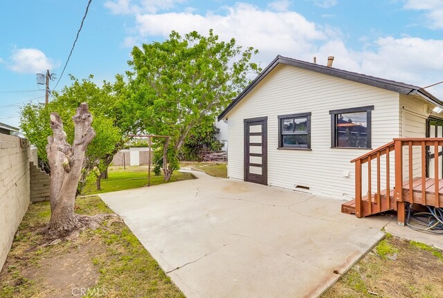 1677 252nd St, Harbor City, CA 90710 - back of property featuring a patio