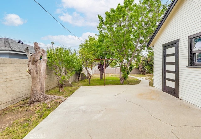 1677 252nd St, Harbor City, CA 90710 - fenced backyard featuring a patio area