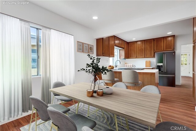 1677 252nd St, Harbor City, CA 90710 - dining area with wood finished floors and recessed lighting