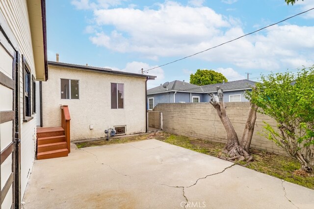 1677 252nd St, Harbor City, CA 90710 - fenced backyard featuring a patio area