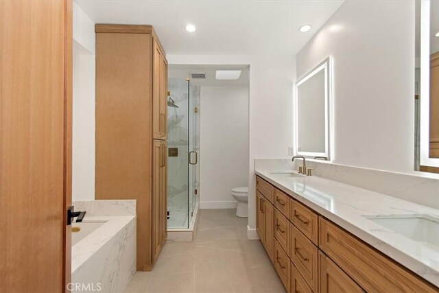 13044 Mindanao Way Unit 3, Marina Del Rey, CA 90292 - full bathroom featuring toilet, a marble finish shower, tile patterned floors, a bath, and double vanity