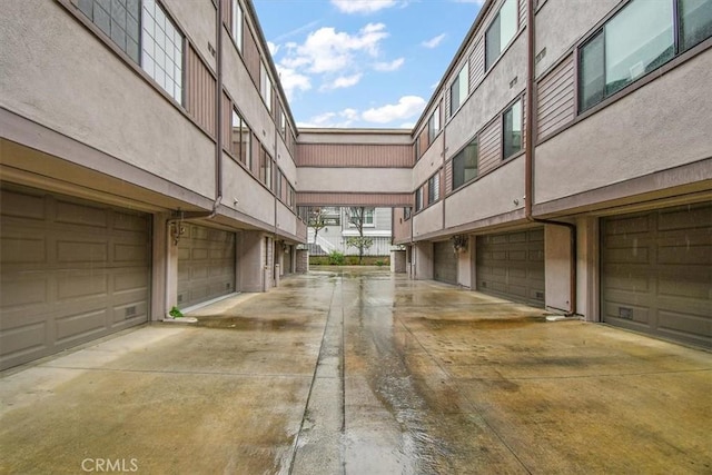 13044 Mindanao Way Unit 3, Marina Del Rey, CA 90292 - view of property's community featuring an attached garage and driveway