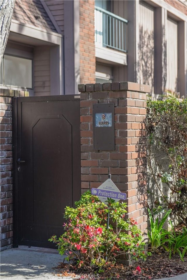 13044 Mindanao Way Unit 3, Marina Del Rey, CA 90292 - view of exterior entry featuring brick siding