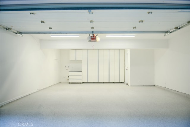 13044 Mindanao Way Unit 3, Marina Del Rey, CA 90292 - garage with a garage door opener and baseboards
