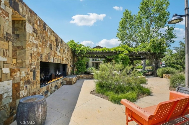 view of home's community featuring a patio area