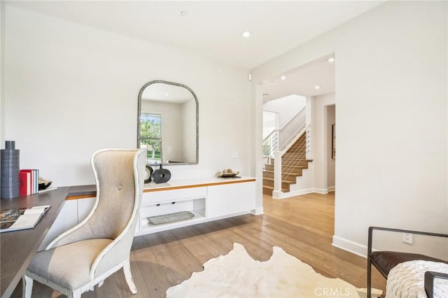 office with wood finished floors, baseboards, and recessed lighting