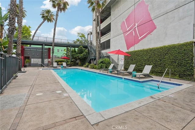 community pool with fence