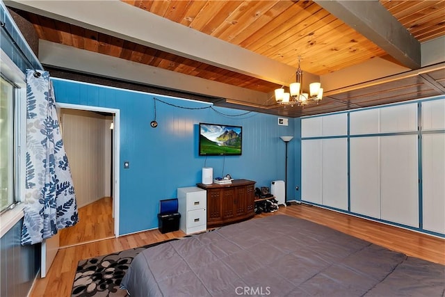 770 Berne Dr, Crestline, CA 92325 - bedroom with beam ceiling, a chandelier, wooden ceiling, and wood finished floors