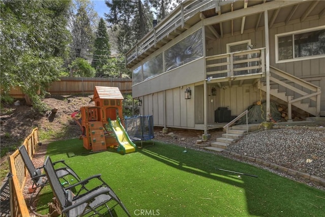770 Berne Dr, Crestline, CA 92325 - view of jungle gym featuring a trampoline and stairs