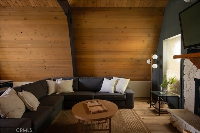 265 Grizzly Rd, Lake Arrowhead, CA 92317 - living area featuring light wood-style floors, wood walls, wood ceiling, and a fireplace