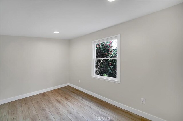 212 La Paloma, San Clemente, CA 92672 - spare room with baseboards, recessed lighting, and light wood-style floors