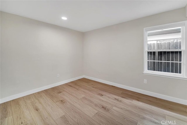 212 La Paloma, San Clemente, CA 92672 - empty room with baseboards, light wood finished floors, and recessed lighting