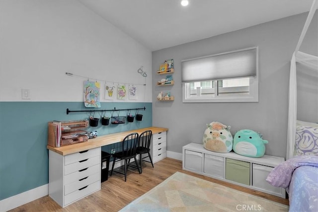 office featuring light wood-style flooring and baseboards