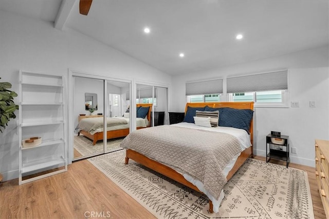 bedroom featuring multiple closets, light wood-style flooring, recessed lighting, and baseboards