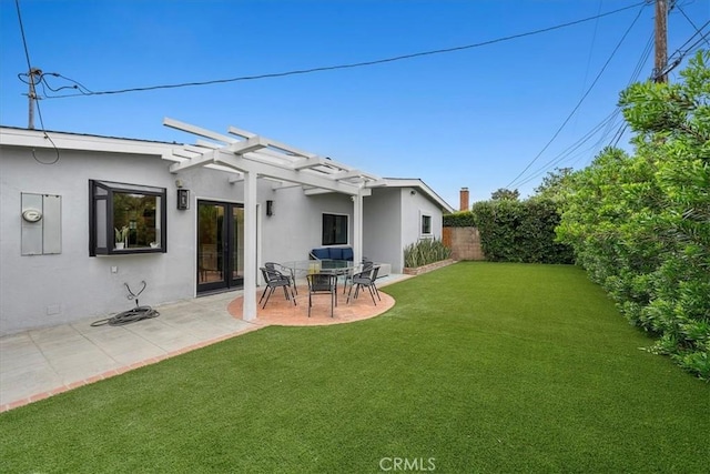 back of property featuring stucco siding, a pergola, and a patio