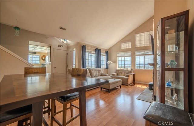 539 Elk Ridge Way, San Jose, CA 95136 - living room featuring healthy amount of natural light, wood finished floors, and high vaulted ceiling