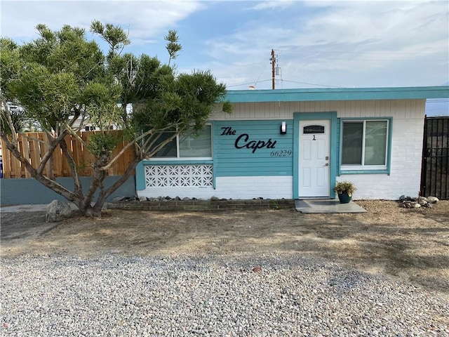 66229 8th St, Desert Hot Springs, CA 92240 - view of front facade with concrete block siding
