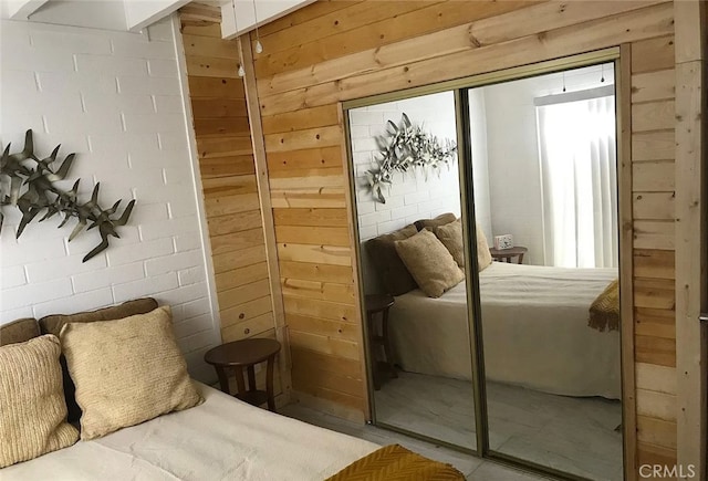 66229 8th St, Desert Hot Springs, CA 92240 - bedroom with wooden walls and a closet