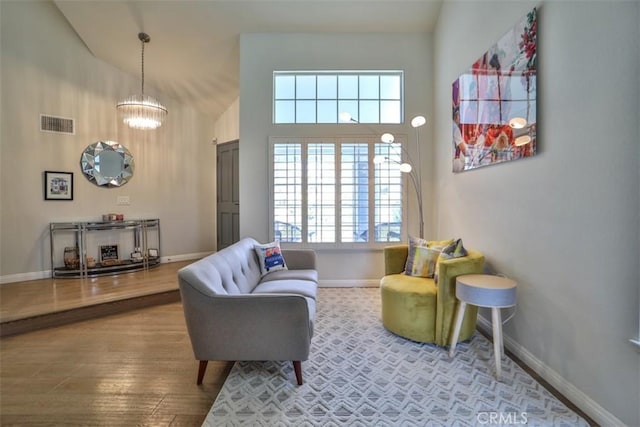1398 Carissa St, Upland, CA 91784 - living area with baseboards, high vaulted ceiling, and wood finished floors