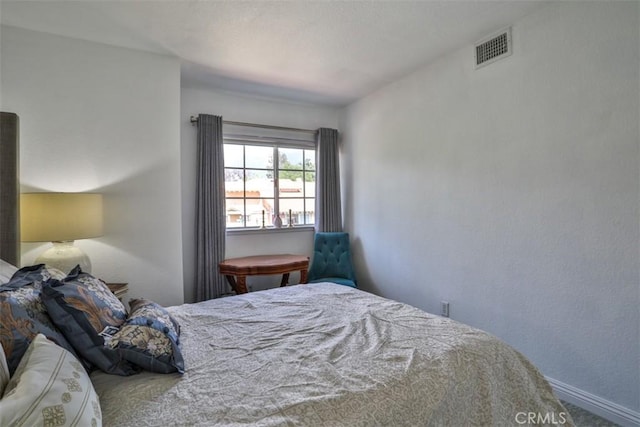 1398 Carissa St, Upland, CA 91784 - carpeted bedroom featuring baseboards